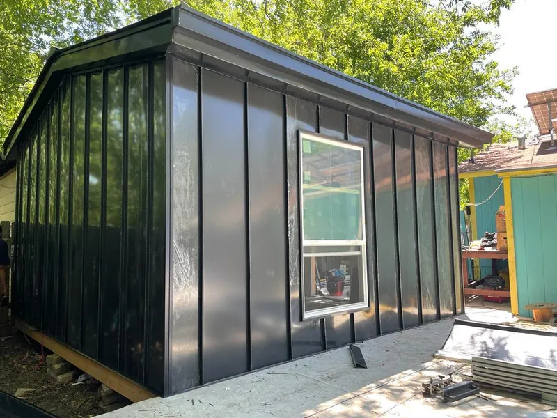 Black standing seam metal wall panels for Metal Roof Installation in Arkadelphia