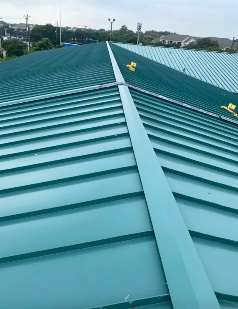 Green commercial metal roof ridge and valley for Metal Roof Repair in Arkadelphia