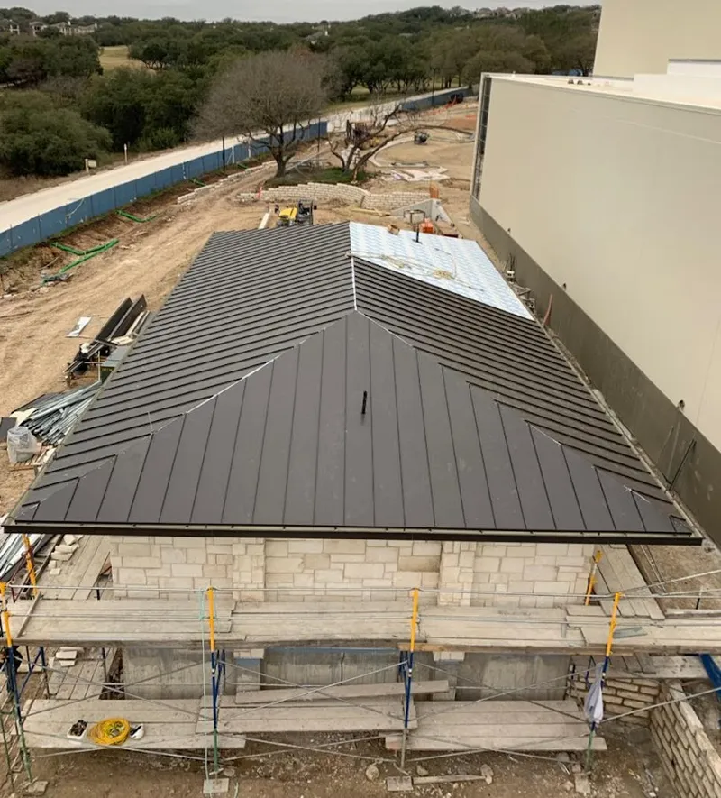 Metal roof new construction with scaffolding in Arkadelphia